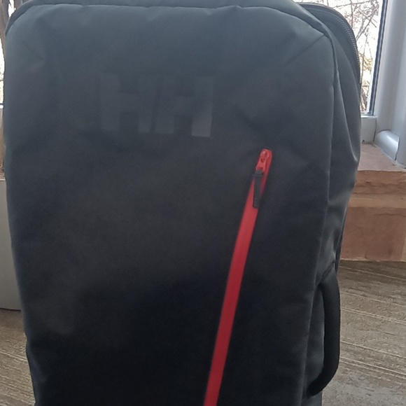 Hailey Hansen roll behind luggage - Picture 1 of 3